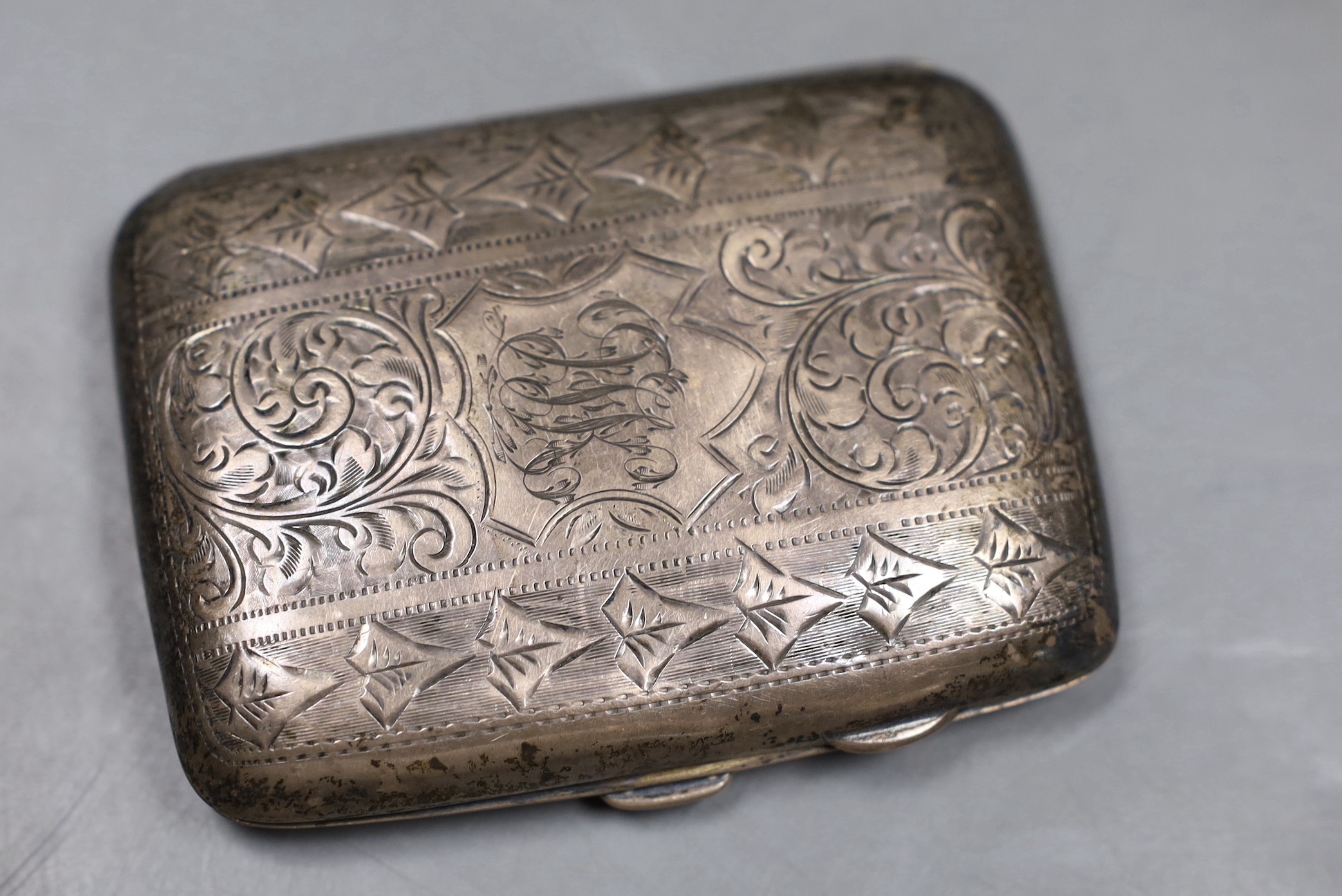 A George V silver pedestal dish, with presentation inscription, Barker Brothers , Chester, 1918, diameter 21.2cm, 9oz, a silver cigarette case and a silver mounted rectangular trinket box